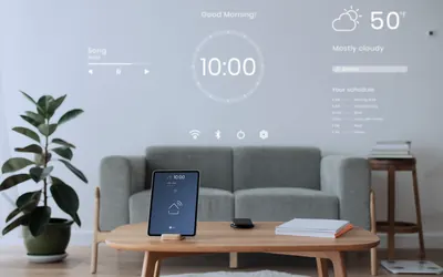 Sala de estar com tablet de controle de automação residencial sobre a mesa de centro